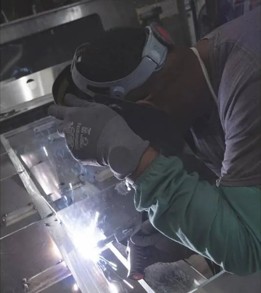 A welder at work, from a Concept Unlimited brand film